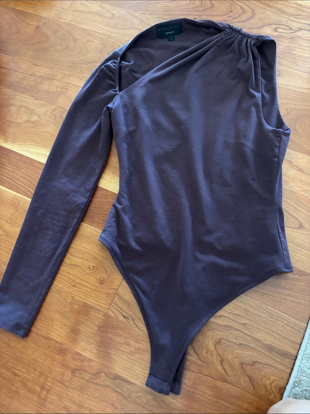 One-Shoulder Long Sleeve Bodysuit in Deep Plum